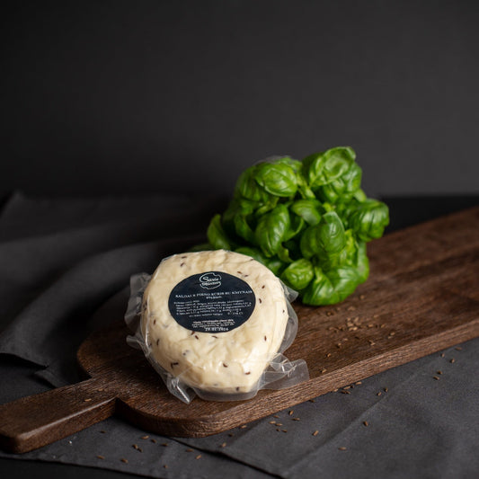 Saldaus pieno sūris su kmynais 6 % rieb.